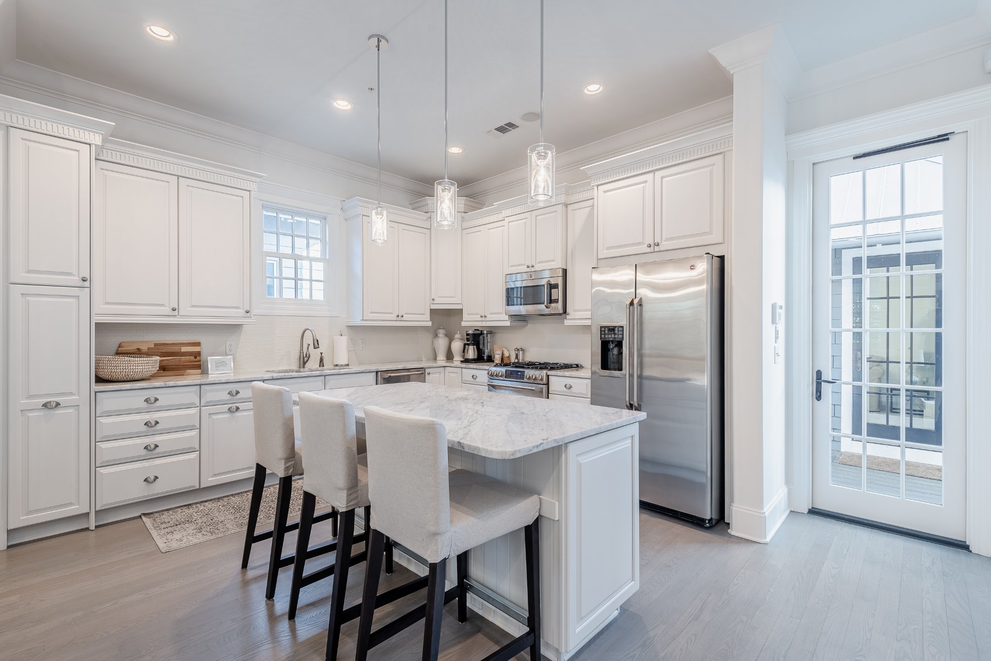 Gourmet kitchen marble island Rosemary Beach home